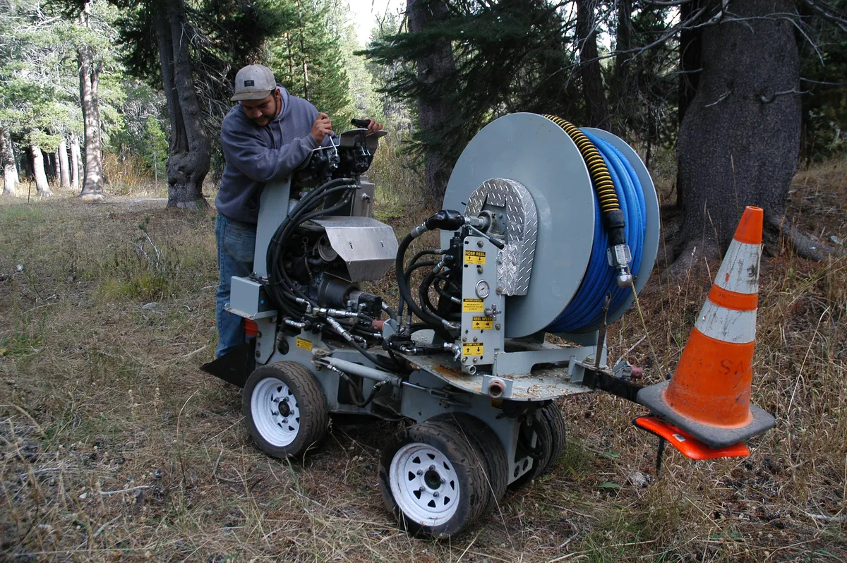 Hydro-jetting and line-flushing work on a District sewer segment.